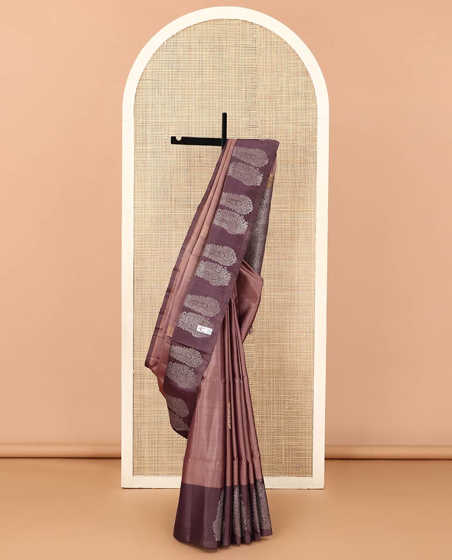 Brown paisley buttas soft silk saree, contrast paisley buttas woven border, and pallu of paisley jaal designs