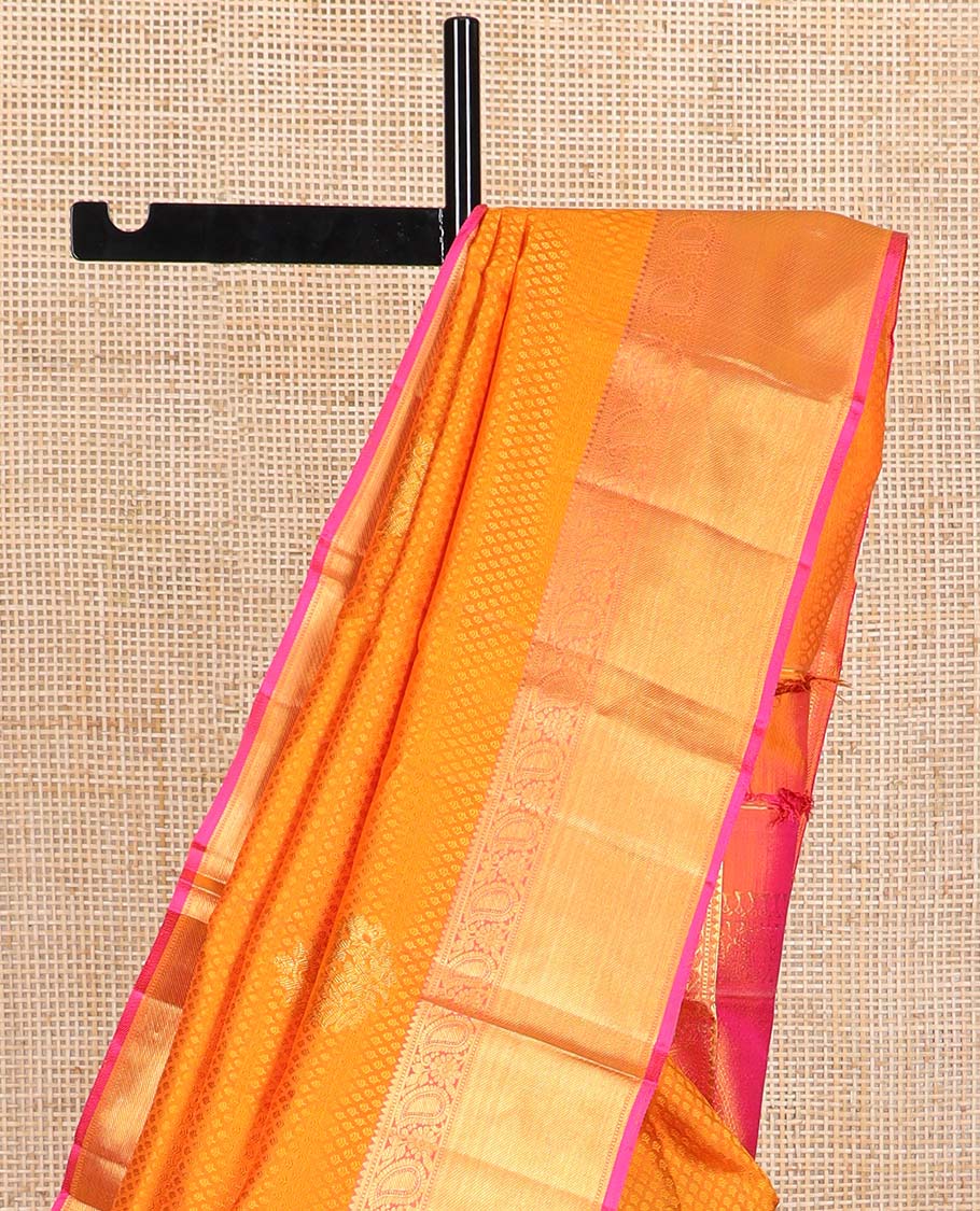 Orange floral jaal design silk saree with contrast border of rekku, muthu, manga, banaras design & zari design pallu