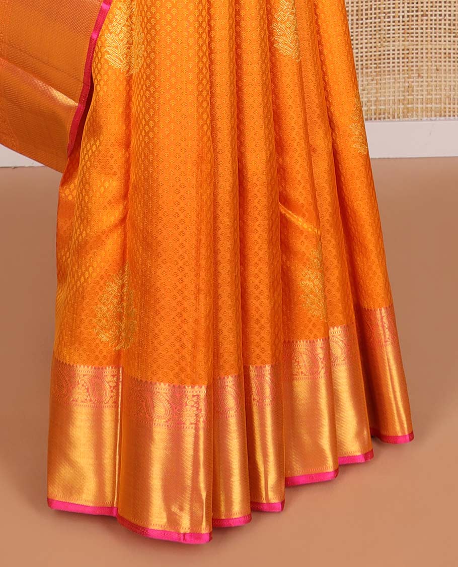 Orange floral jaal design silk saree with contrast border of rekku, muthu, manga, banaras design & zari design pallu