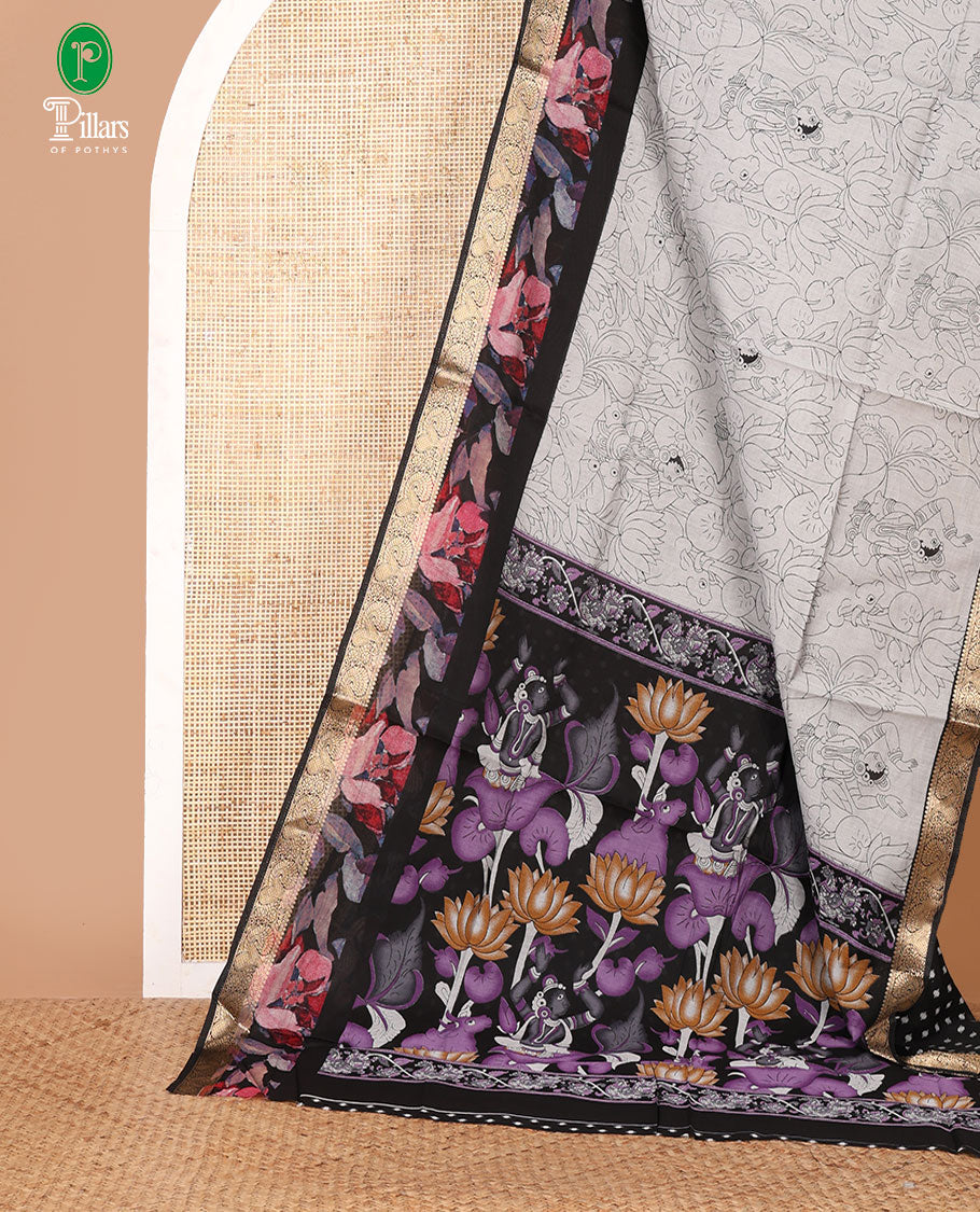 Grey kalamkari-style cow, lotus & human motifs printed Assam cotton saree, contrast floral print & zari paisley border & printed blouse
