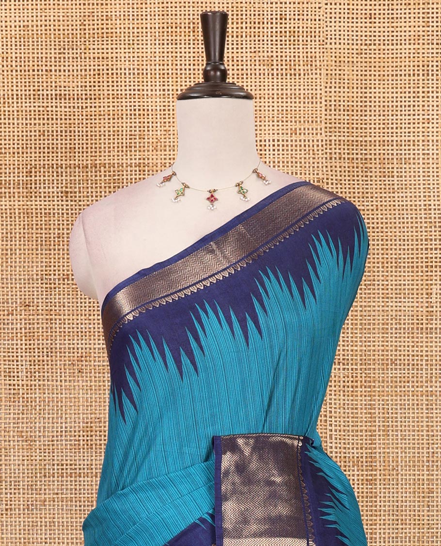 Blue striped dola-tussar saree, contrast temple zari border, patola animal motifs enclosed jaal printed pallu & patola printed blouse