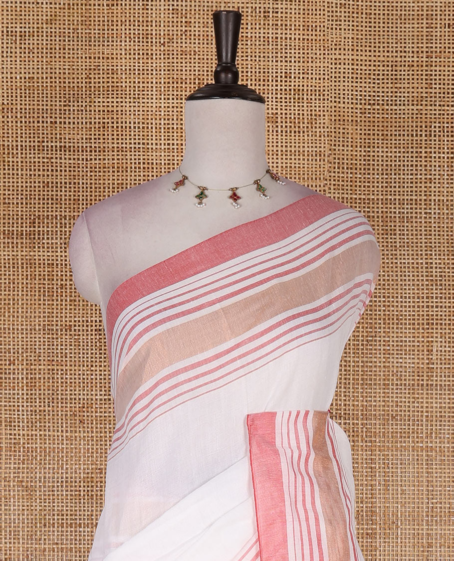 Cream-pink plain design mul mul cotton saree, contrast copper zari horizontally striped border, plain pallu, and plain blouse