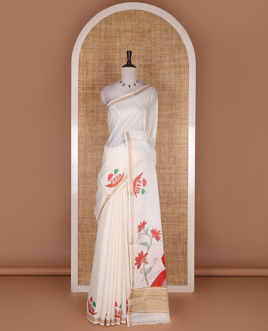 Half-white boat motifs printed Kerala cotton saree, zari border, pallu of kathakali print, and a matching blouse