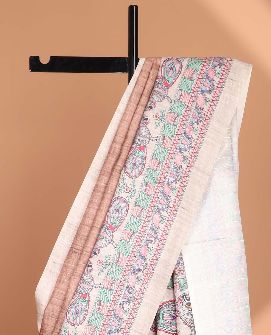 Brown plain semi tussar saree with mudhubani printed border & madhu bani printed pallu, with tussels, small flower printed blouse