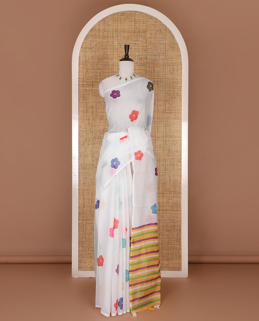 Borderless White colorful five-petal flower motifs printed linen cotton saree, multi-color striped pallu, and contrast printed blouse