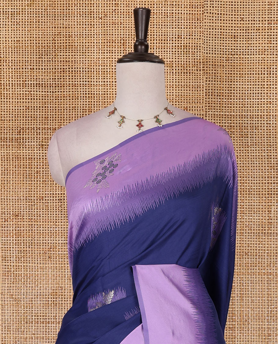 Navy blue-lavender floral buttas elite soft silk saree, contrast floral buttas border, and pallu of Mughal-style intricate zari designs