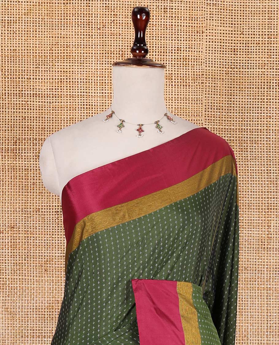 Olive green-pink plus-shaped buttas steeped semi-soft silk saree, contrast satin border of stripes, striped pallu, and contrast blouse