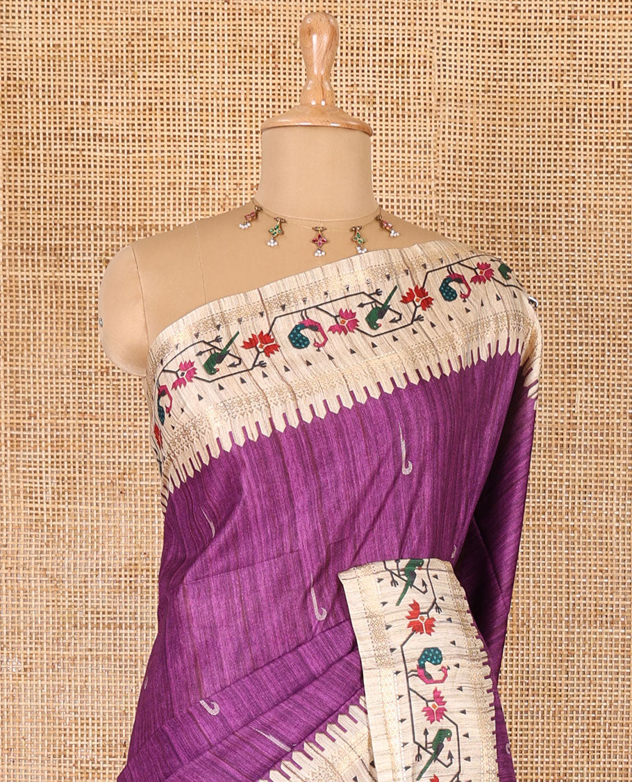 Dark violet muniya motifs katan silk saree, contrast paithani style border, pallu and blouse steeped with peacock, parrot, and floral motifs,