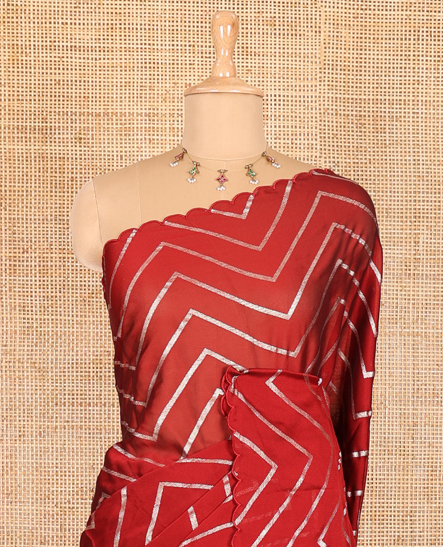 Borderless maroon zig-zag stripes gold foil printed, scallop-edged rangoli chiffon saree with a matching bandhani dotted blouse