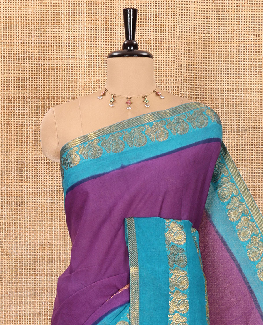 Violet plain sungudi cotton saree with contrast traditional border of peacocks, zari striped pallu, and a contrast zari checked blouse