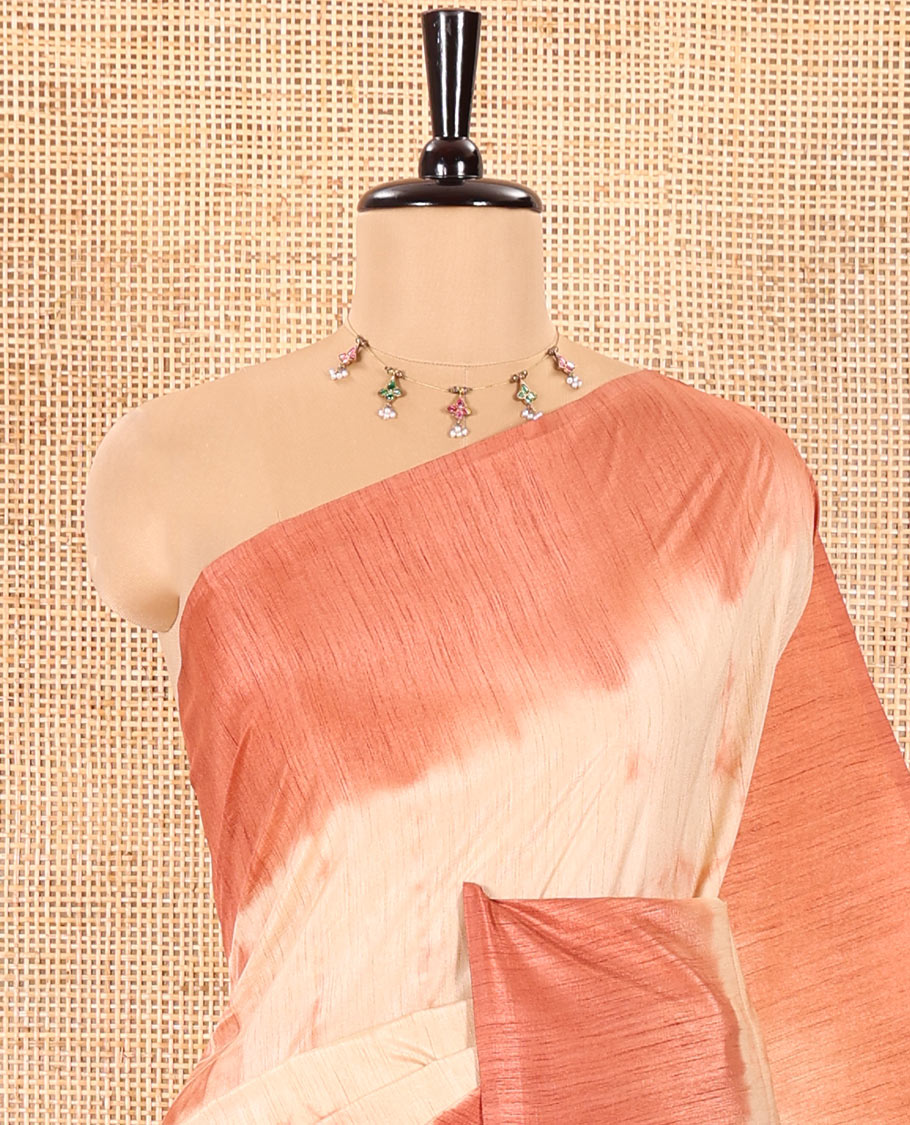 Cream and Rust Jute Tussar Saree Subtly Decked Up with Shibori Print, Captivating Contrast Border of Shibori Print, Pallu of the Same Shibori Print, and Comes with a Contrast Blouse