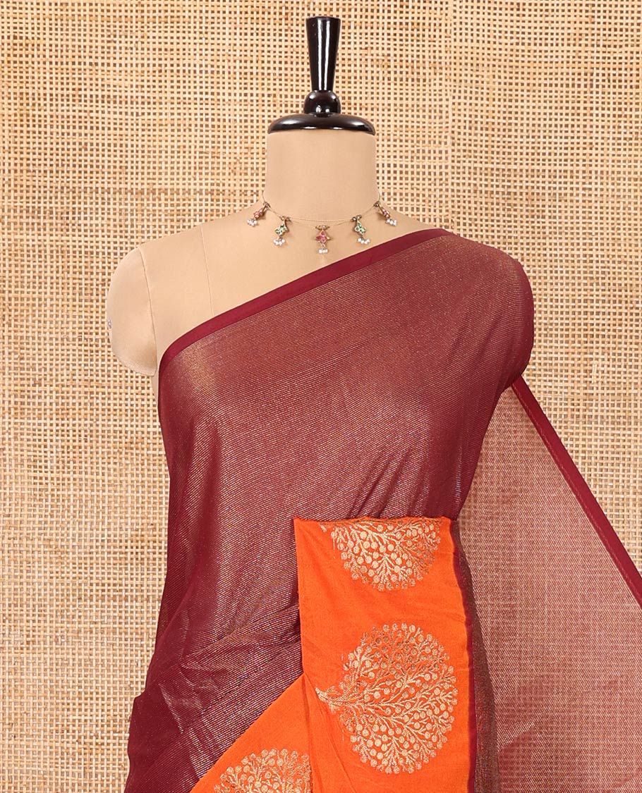 Brown Tissue-Cotton Blended Saree, Subtly Sparkled with Vertical Stripes on Its Body, Complemented by Contrast Border of Tree Motifs Woven, a Pallu Steeped with Zari Stripes, and Paired with a Contrast Blouse