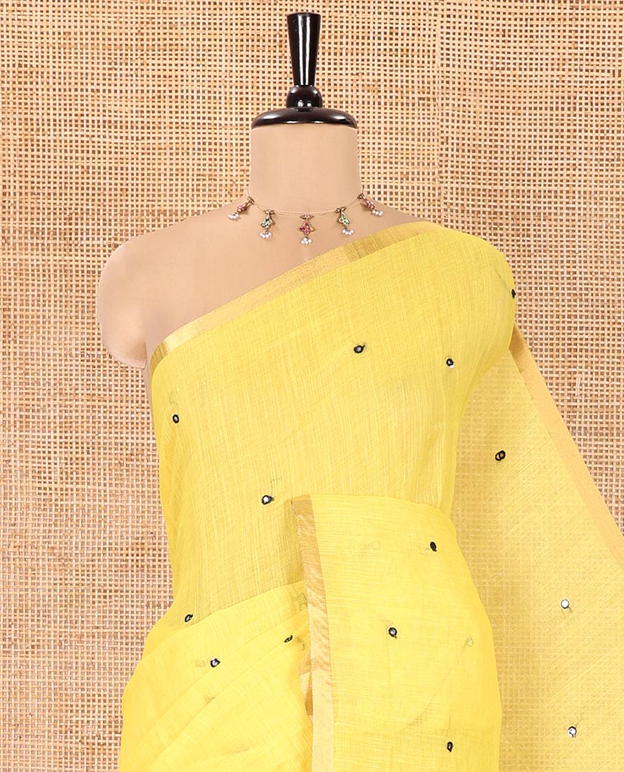 Yellow Linen Cotton Saree, Graced with Mirror Work Across Its Body, Subtly Piping Border, Contrast Pallu Steeped with Stripes, and Mirror Work, and Paired with a Contrast Vertical Stripes Printed Blouse