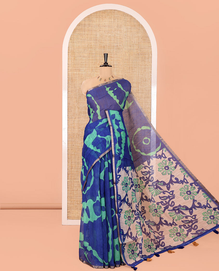 Navy Blue Linen Cotton Saree, Ornamented with Shibori Printed on Its Body, Subtle Piping Border, Pallu of Floral Vine Print, and Paired with a Contrast Floral Vine Printed Blouse