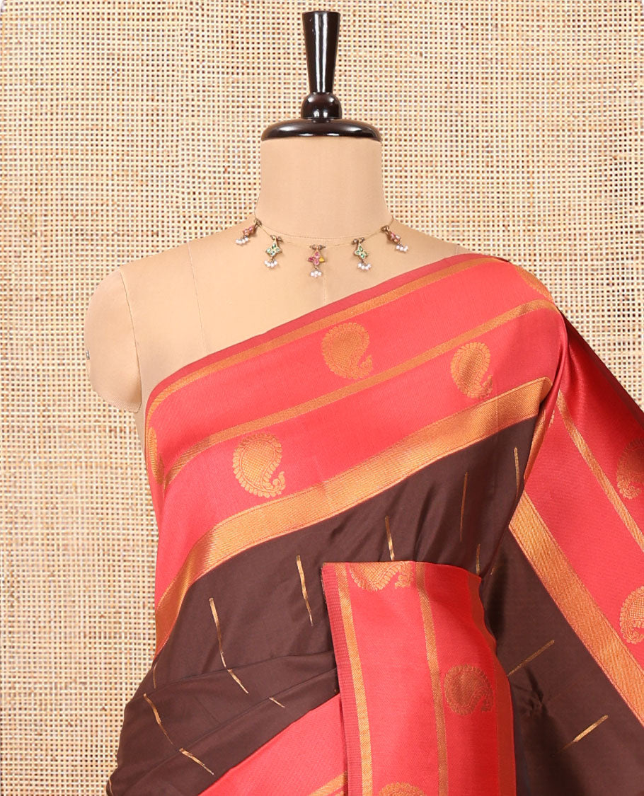 Brown and Red Kanchi Silk Saree, Accentuated with Zari Buttas All Over Its Body, Complemented by a Contrast Border of Paisleys, Zari-Striped Pallu, and Paired with a Contrast Jacquard Blouse