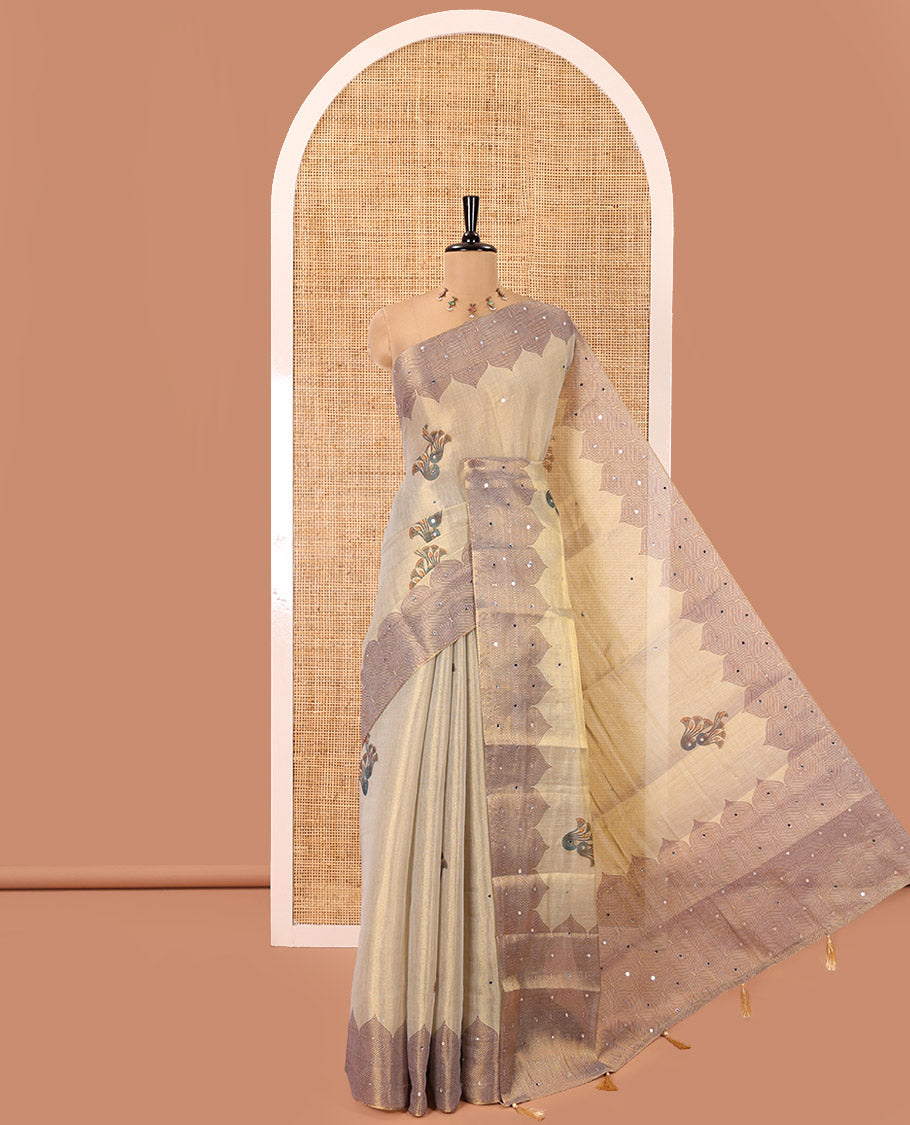 Cream Tissue Saree, Ornamented with Floral Buttas and Mirrorwork, a Self-Border, Ogee Print Pallu, and a Matching Blouse
