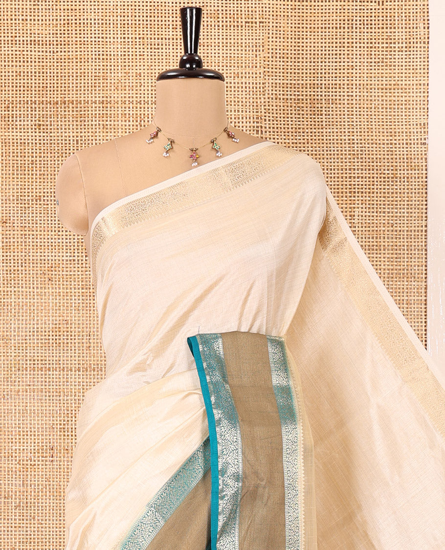 Cream and Rama Plain Art Tussar Saree, Complemented by a Contrast Rettai Pettu Traditional Zari Border, Zari Striped Pallu, and Paired with a Contrast Blouse
