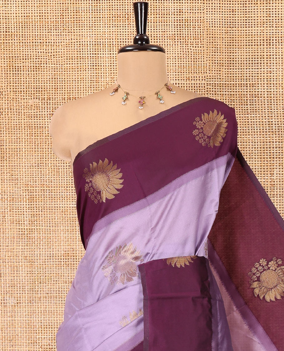 Lavender Kanchi Silk Saree, Gracefully Embellished with Floral Zari Buttas All Over Its Body, Complemented by Contrast Floral Design Border, Intricately Designed Pallu, and Paired with a Contrast Blouse