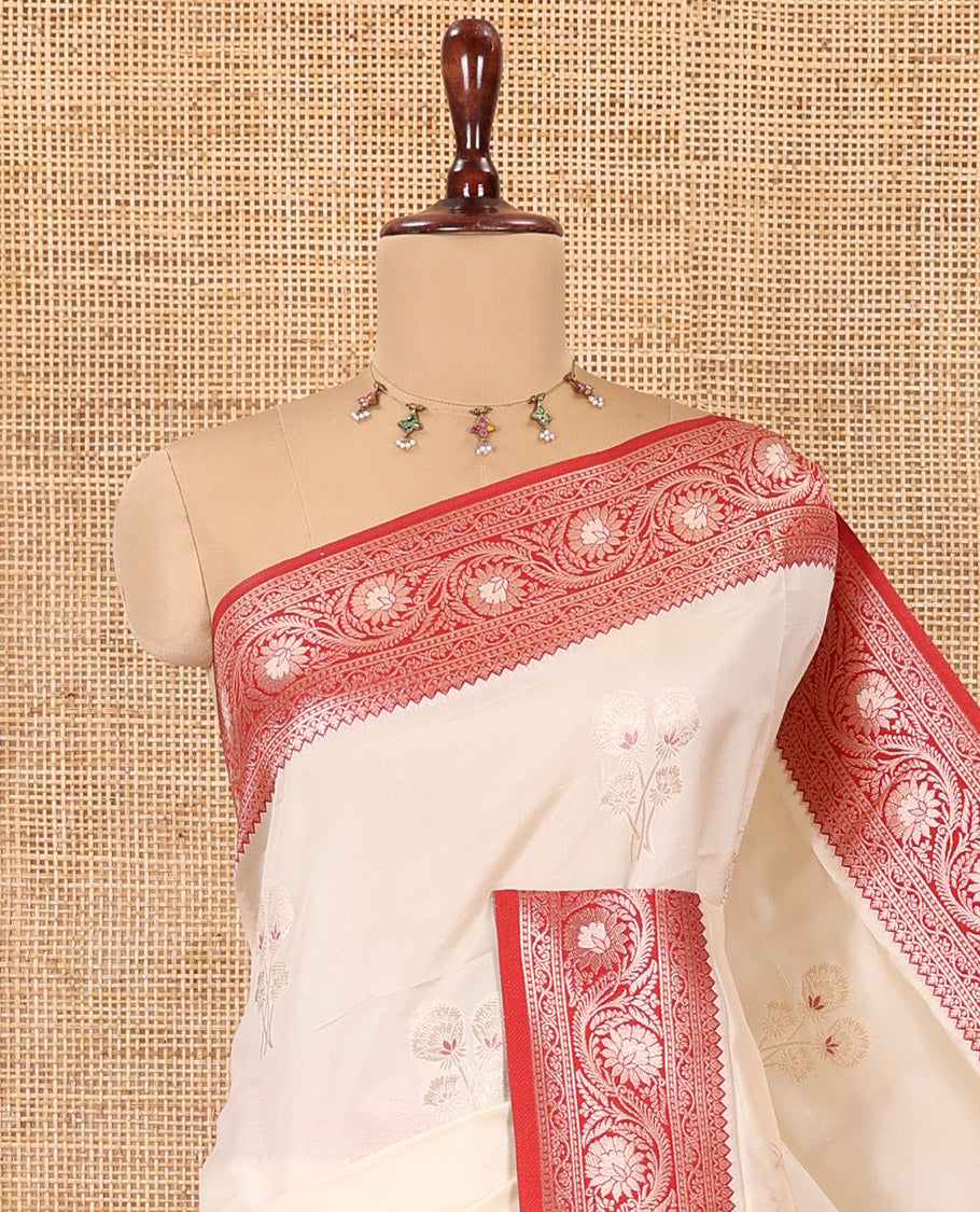 Cream-Red Elite Soft Silk Saree, Decorated with Zari Buttas, a Contrast Floral Creeper Border, Intricate Pallu, and a Contrast Blouse
