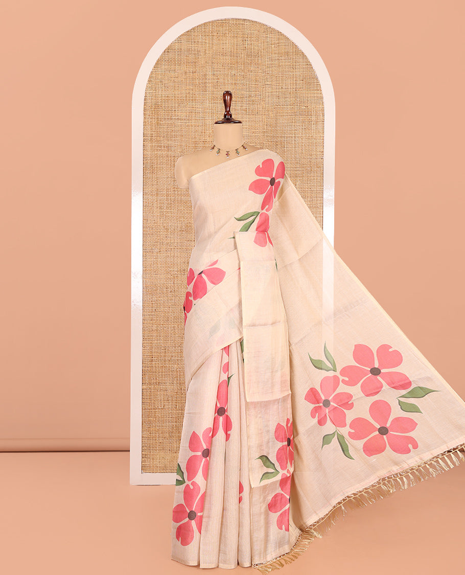 Borderless Cream-Pink Tissue Saree Features Floral Print, a Floral Printed Pallu, and a Contrast Blouse