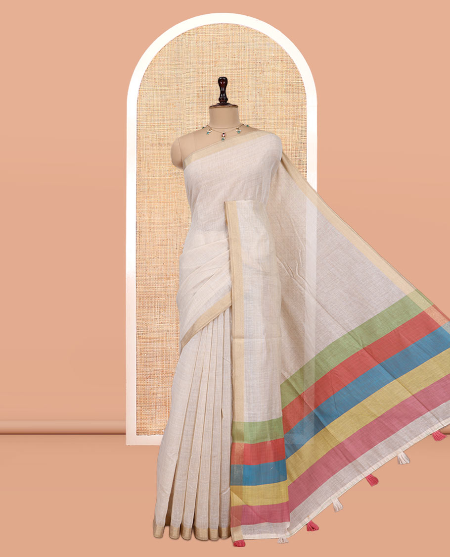 Cream Plain Semi-Tussar Saree, a Zari Border, Multi-Colored Striped Pallu, and a Contrast Blouse