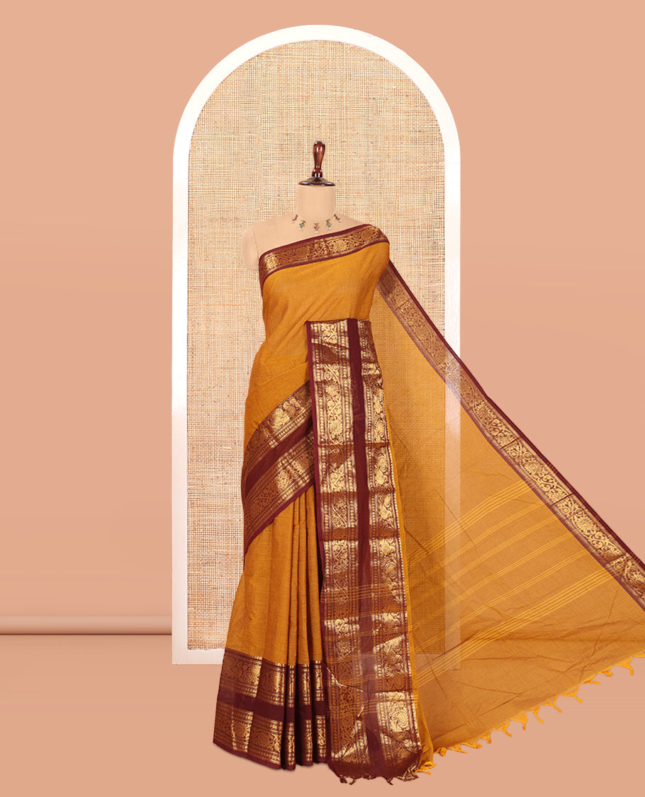 Mustard Plain Chettinad Cotton Saree, a Contrast Rettai Pettu Traditional Zari Border, Striped Pallu, and a Matching Blouse