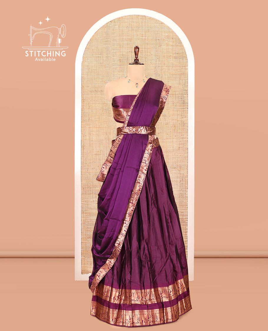 Magenta Semi-Silk Half-Saree Features Plain Skirt, a Rettai Pettu Elephant-Peacock Border, Matching Blouse, and a Dhavani