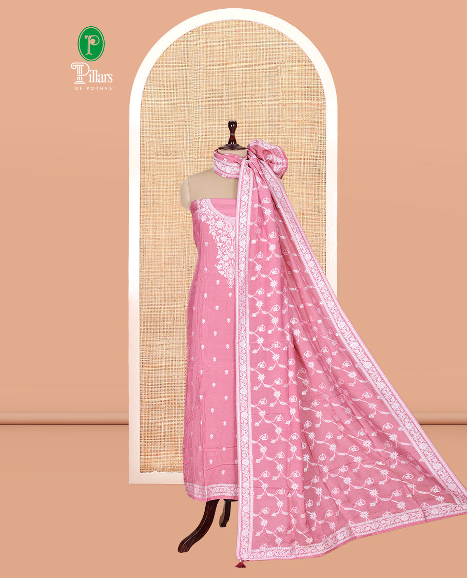 Peach Viscose Muslin Material Churidar Features Buttas Thread Woven Top, a Santoon Bottom, and Floral Jaal Dupatta