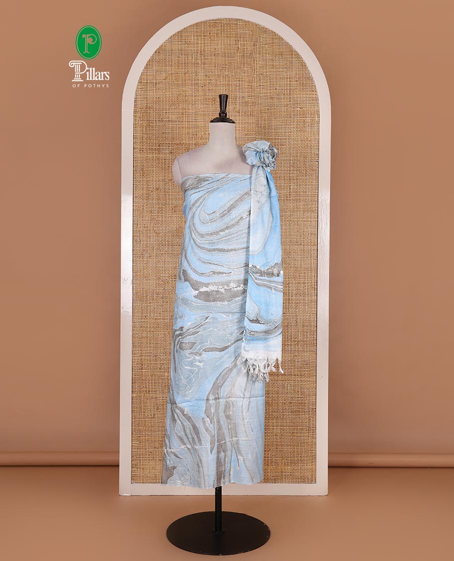 Blue semi-jute cotton material churidar set, abstract marble print top, abstract marble print bottom, and abstract marble print dupatta