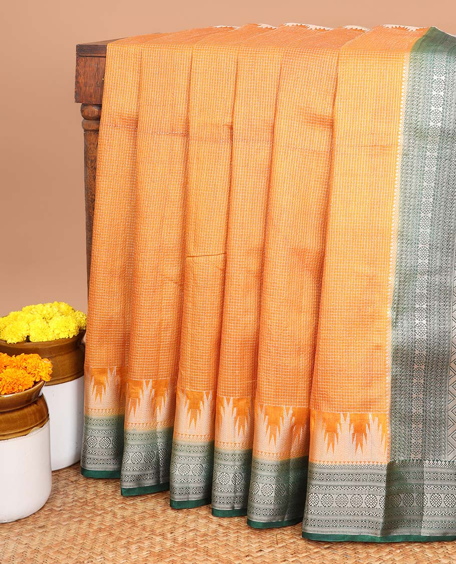 Mustard with green all over small water zari checks with contrast traditional border & contrast zari weaving rich pallu along with zari butta with sequins blouse