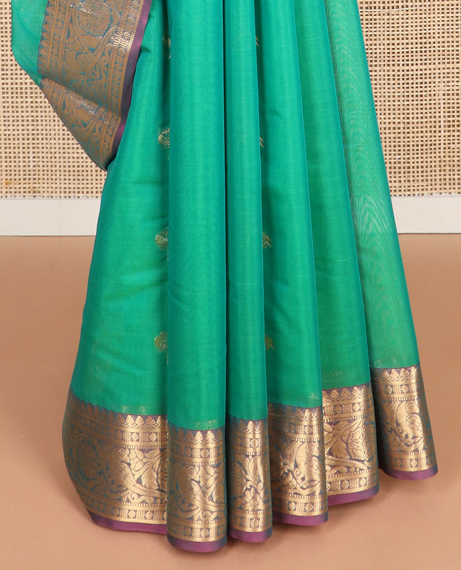 Green floral motifs silk cotton saree with contrast intricate zari design border & floral design pallu