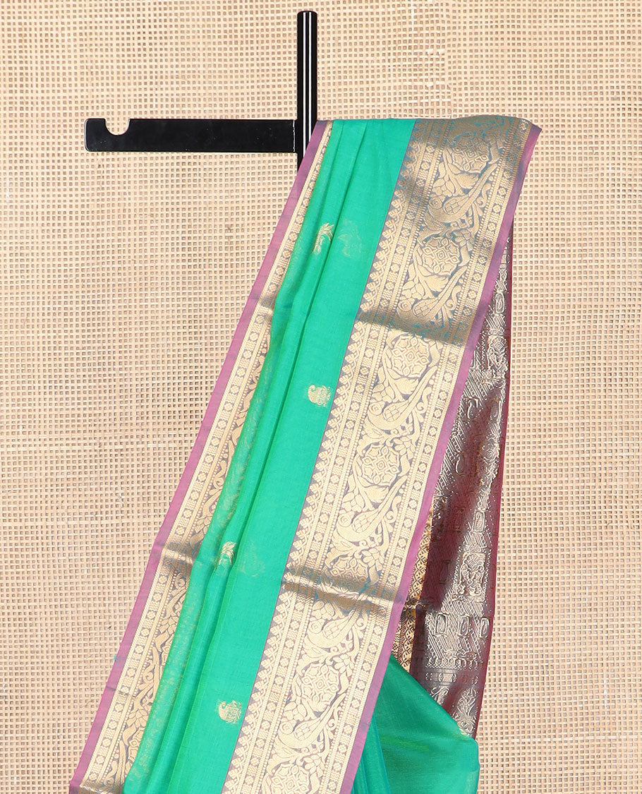 Green floral motifs silk cotton saree with contrast intricate zari design border & floral design pallu