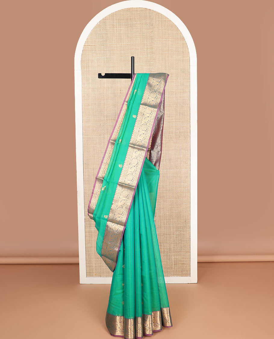 Green floral motifs silk cotton saree with contrast intricate zari design border & floral design pallu