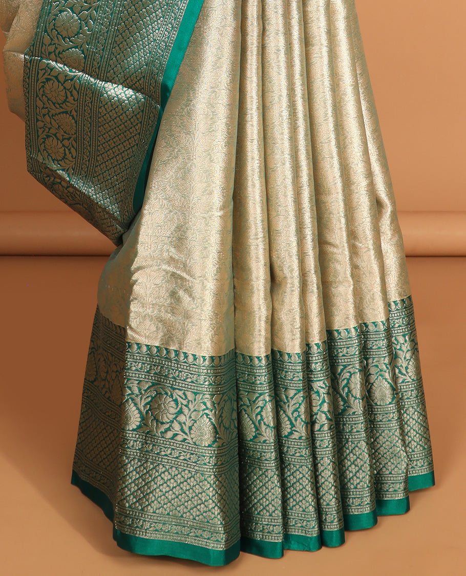 Grey floral jacquard semi tissue saree with contrast floral design border & zari design pallu