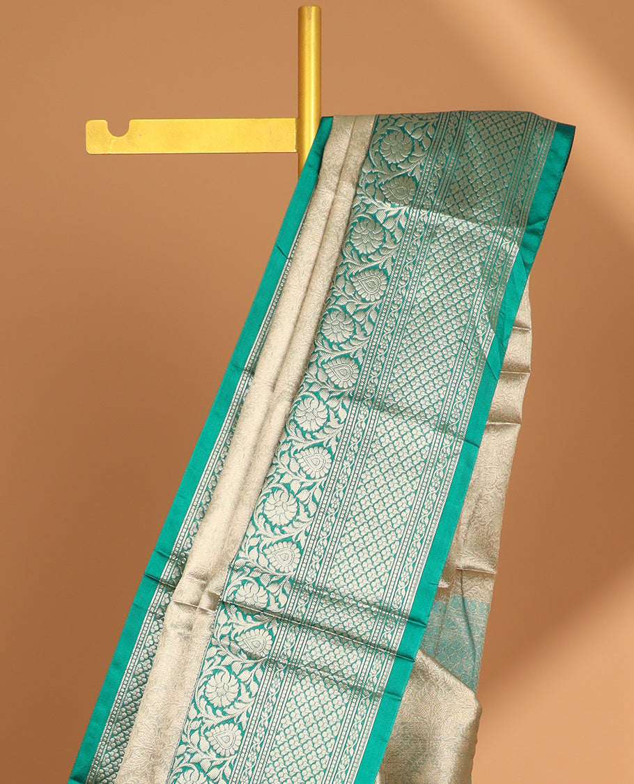 Grey floral jacquard semi tissue saree with contrast floral design border & zari design pallu