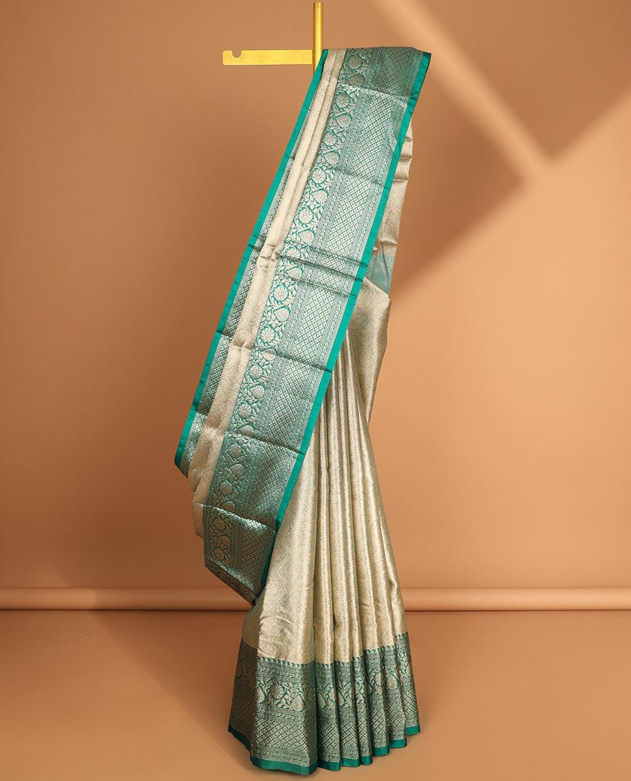 Grey floral jacquard semi tissue saree with contrast floral design border & zari design pallu