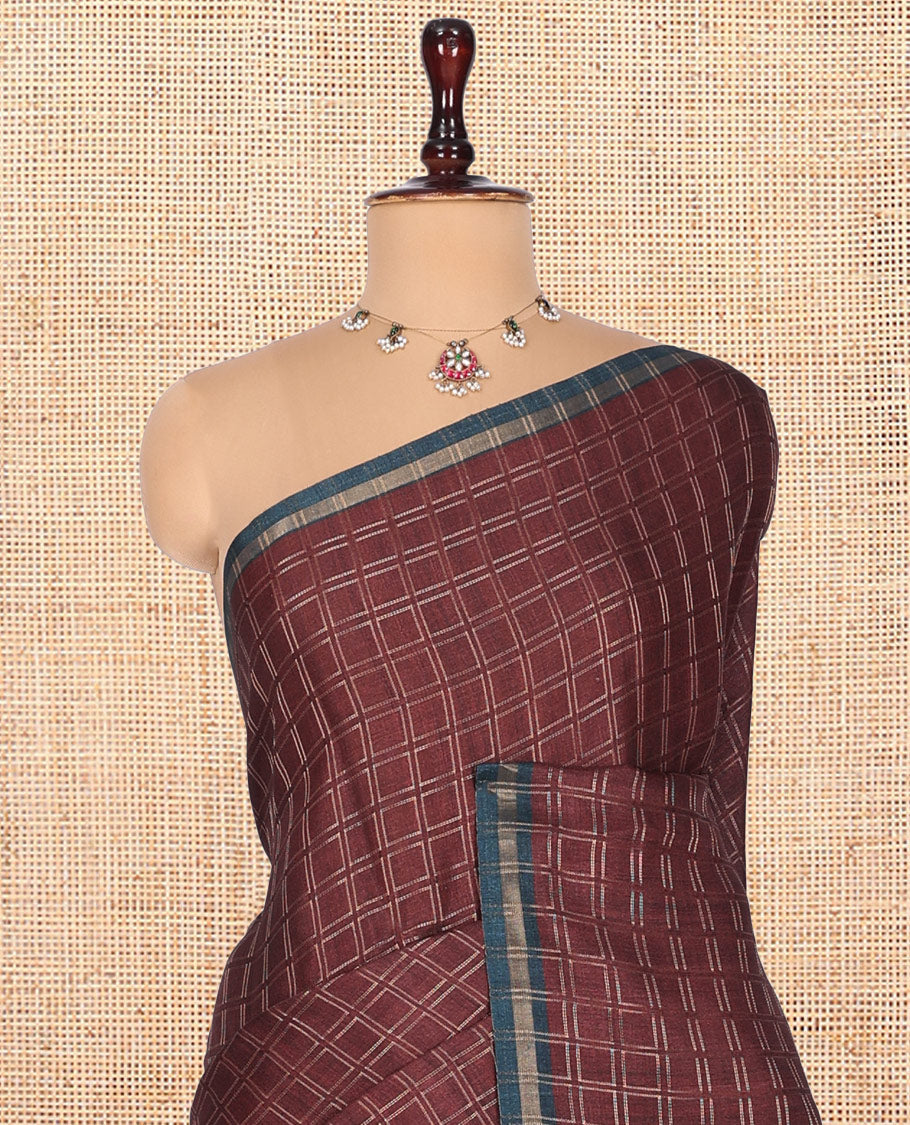 Brown Fancy Tussar Silk Saree, Embellished with Checked Design, Contrast Zari Piping Border, Pallu of Kalamkari Motifs, and Contrast Kalamkari Printed Blouse