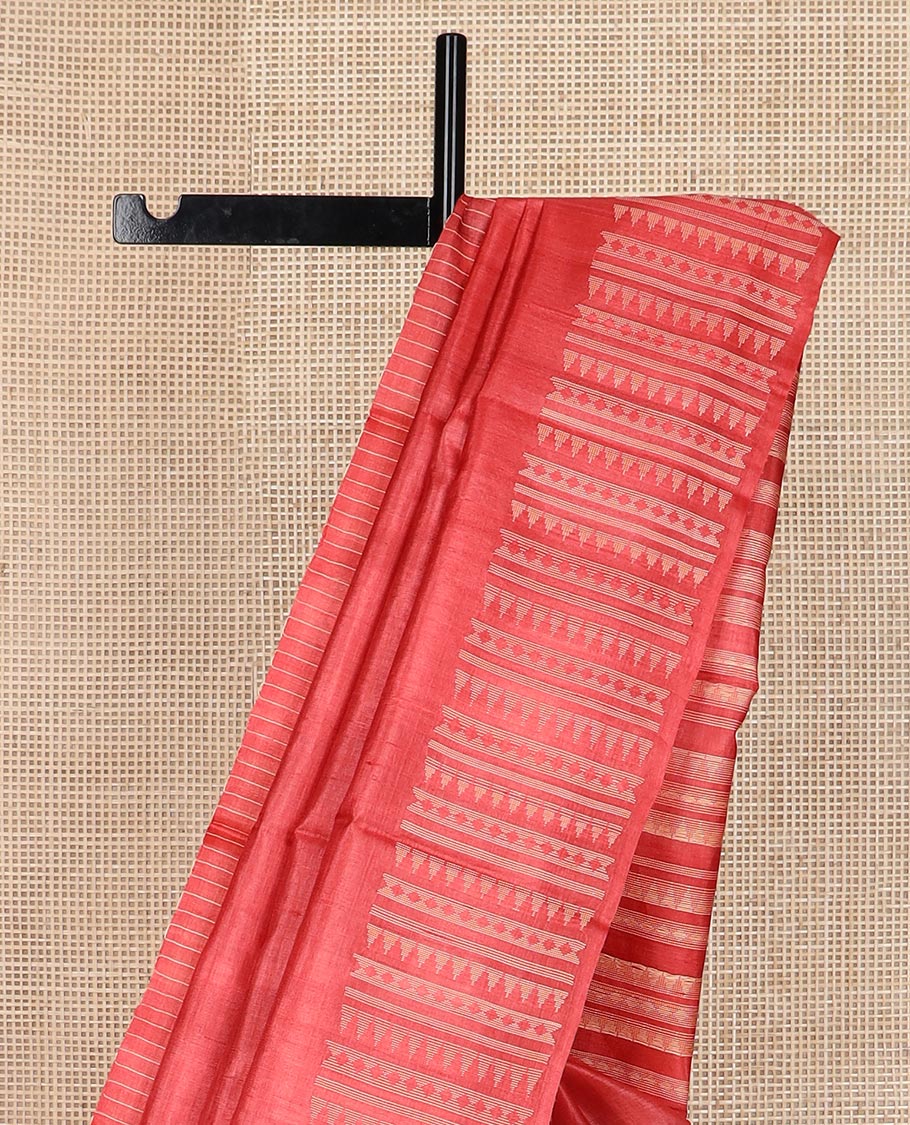 Pink plain tussar silk saree, self border and pallu features geometric patterns, and temple motifs
