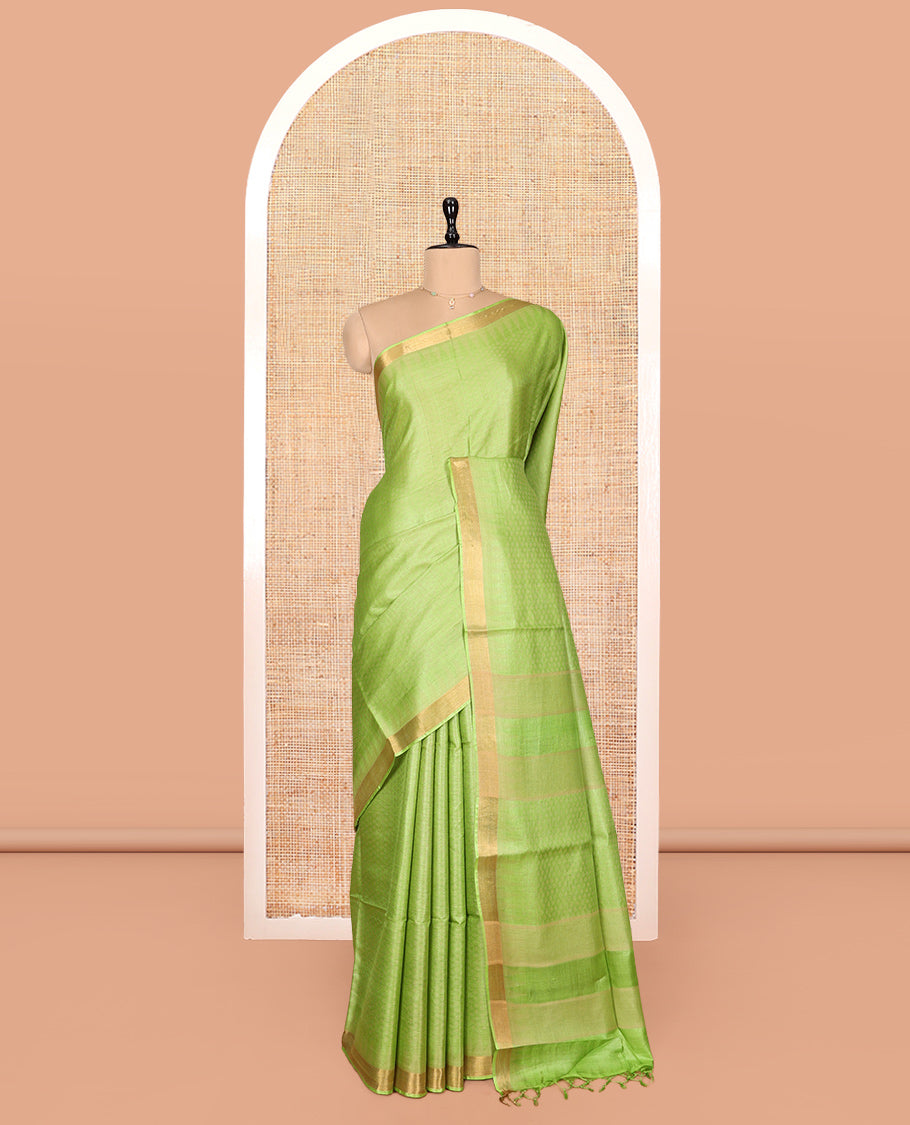 Parrot Green Sparsely Textured Tussar Silk Saree, a Subtle Piping Border, a Self-Pallu, and a Matching Blouse