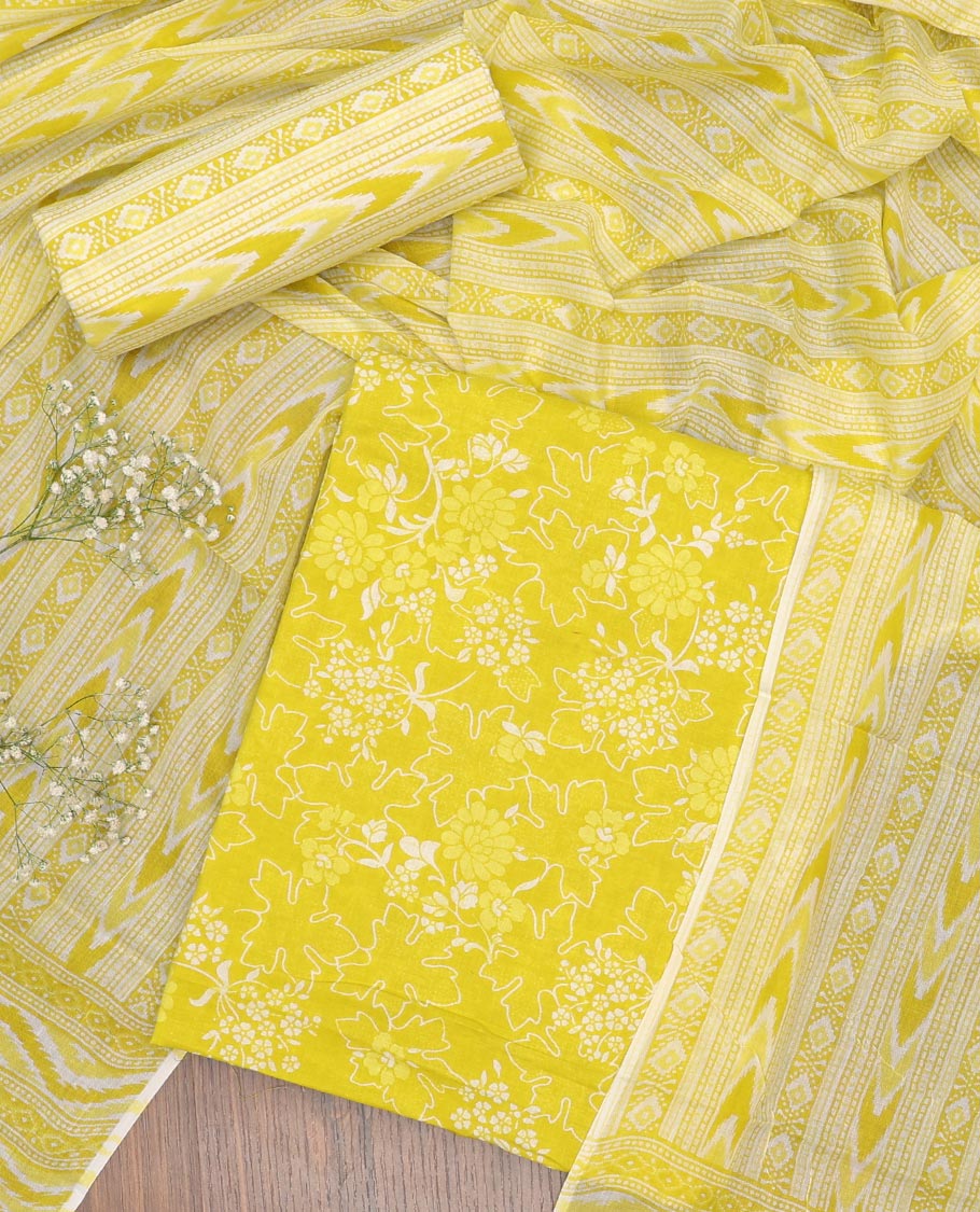 Green chudidhar material set floral vine design top with geomtric design bottom & geometric , floral design dupatta