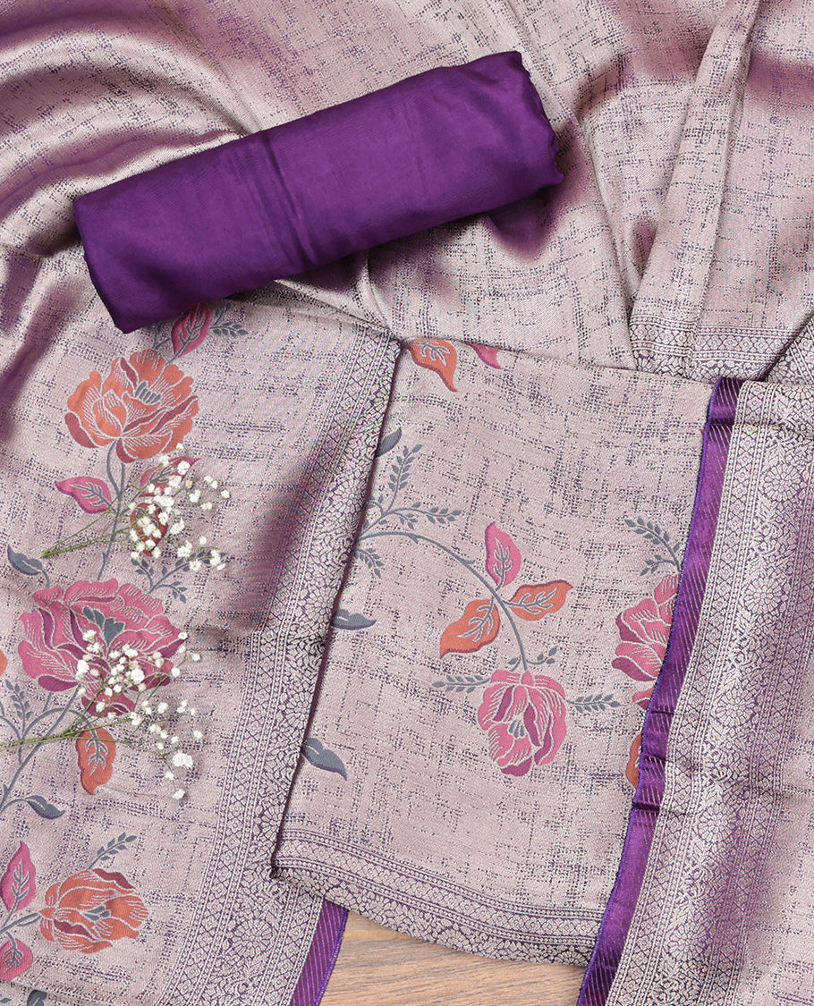 Grey Material Churidar Set, Artfully Detailed with Floral Prints on Its Banarasi-Silk Top, a Contrast Rayon Bottom, and Floral Printed Dupatta