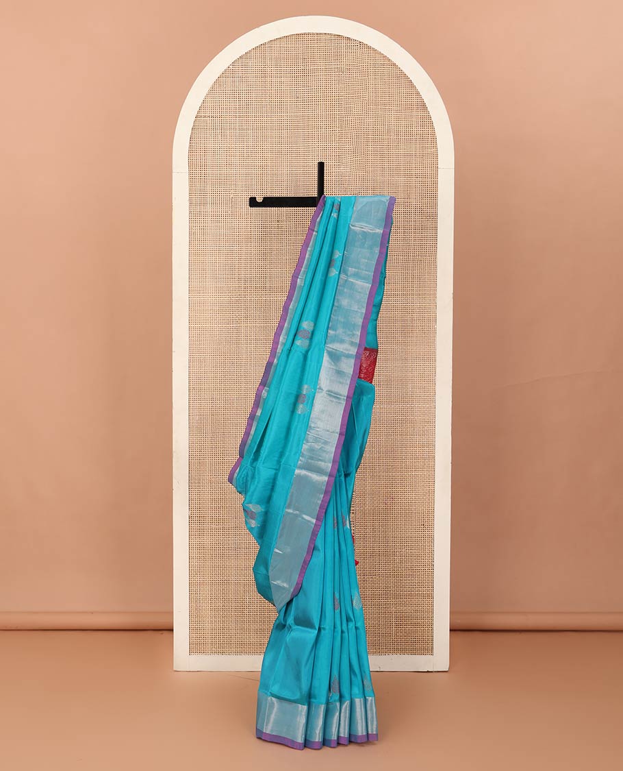 Blue cypress tree buttas Uppada saree, contrast bavanji border, and jaal design pallu