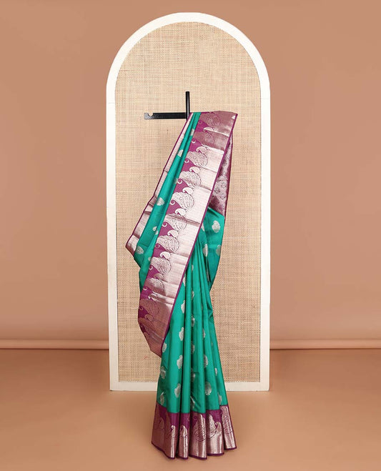 Green manga buttas Vasundhara silk mix saree, contrast manga butta & geometric patterns border & pallu of spade designs