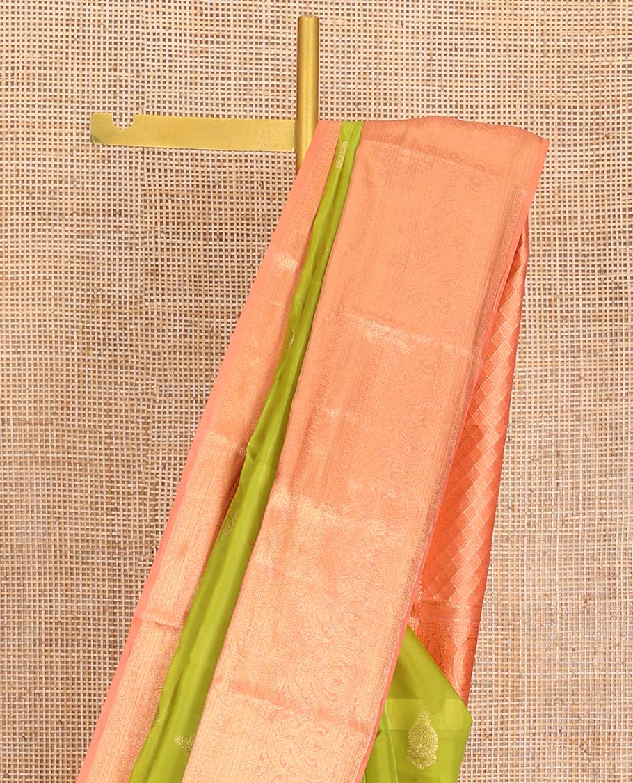 Green Vasundhara Lite-Silk Mix Saree, Embellished with Zari Buttas on Its Body, Complemented by Contrast Border of Mayil Kann, Laddu Kamalam, and Mayil Designs, Gracefully Woven Pallu of Jaal Designs, and Paired with a Contrast Blouse