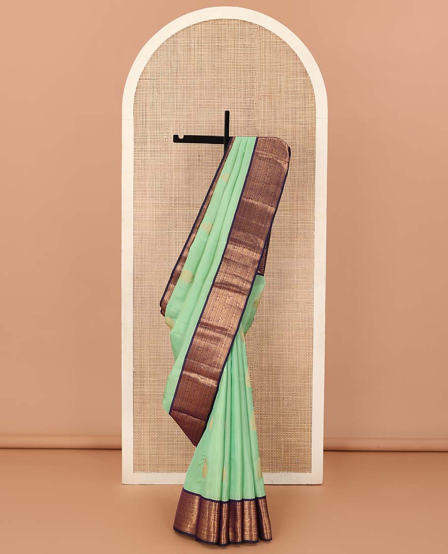 Green zari buttas Vasundhara silk mix saree, contrast traditional zari border, and jaal pallu