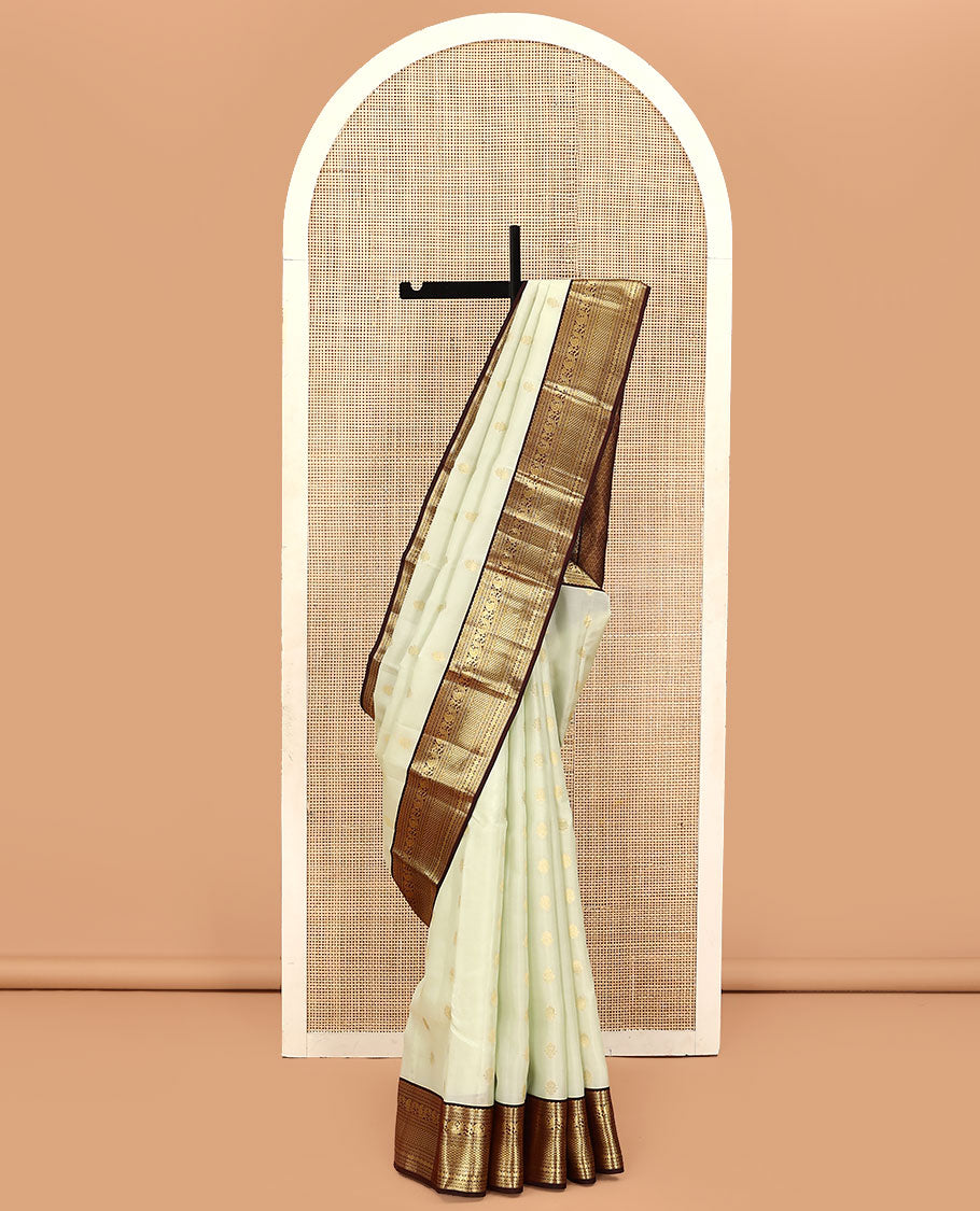Cream Vasundhara Lite Silk Mix Saree, Enthralled with Zari Buttas on Its Body, Complemented by Contrast Border of Muthu, Banaras, Neli, Manga, Mayil Kann, and Rudraksham Designs, Grand Jaal Pallu, and Paired with a Contrast Blouse