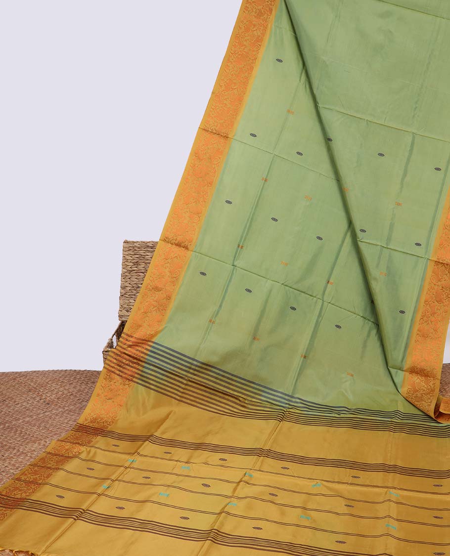 Green floral motifs banana pith saree with contrast zari border & striped zari with floral motifs pallu