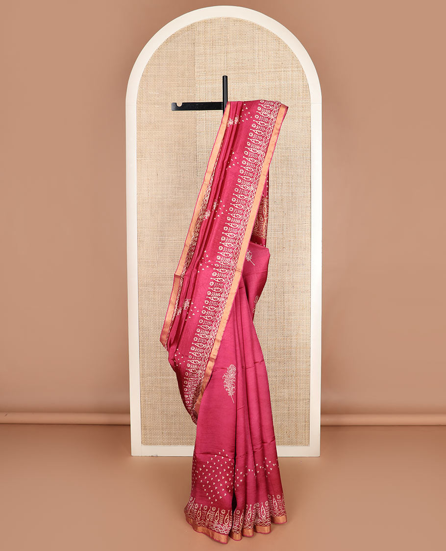 Maroon feather motifs printed banana pith saree, zari with print work border, and printed pallu