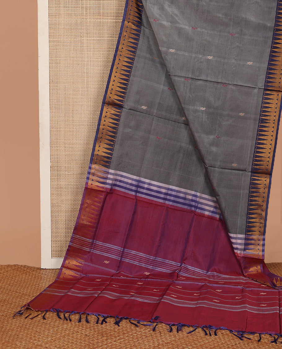 Grey buttas banana pith saree, contrast temple border, and contrast pallu of stripes, and buttas