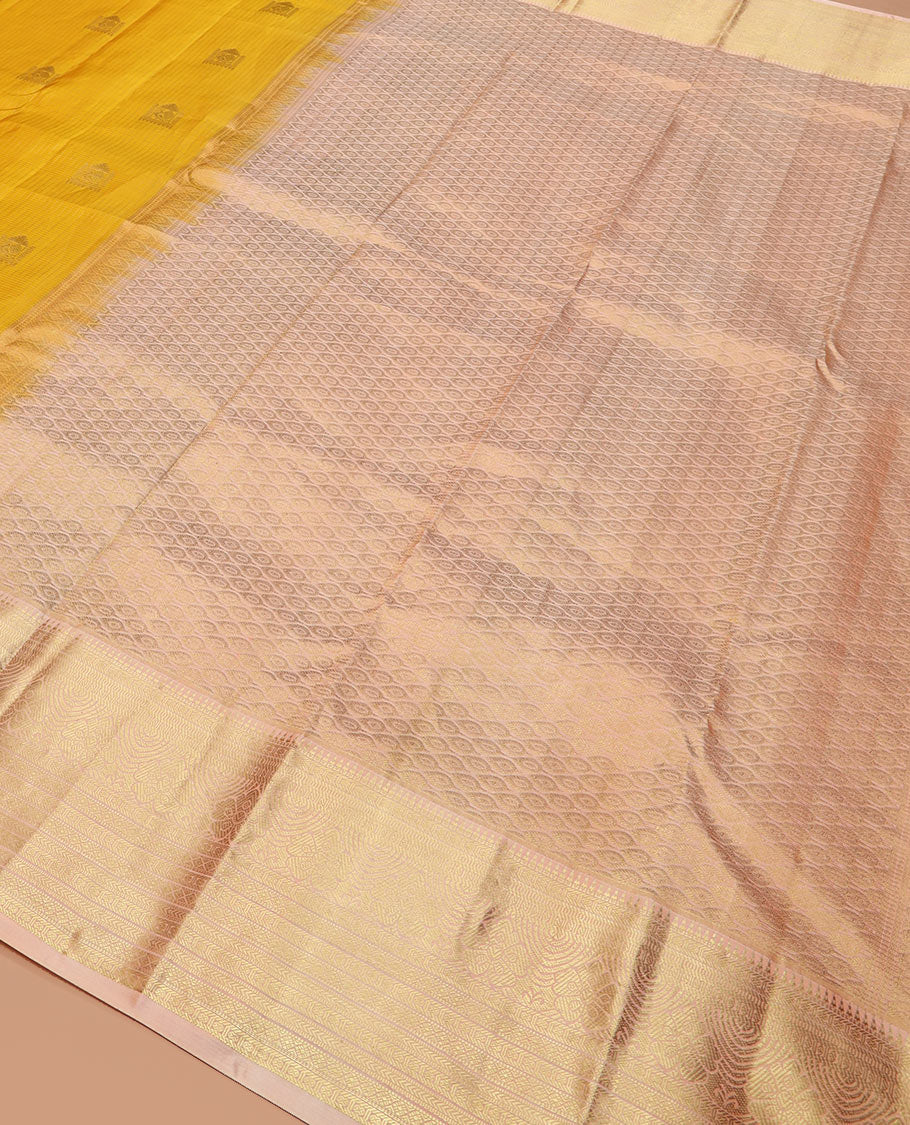 Yellow zari buttas and checked silk saree, contrast border of rekku, muthu, kathir, diamond, rudraksham, and floral designs, and jaal pallu